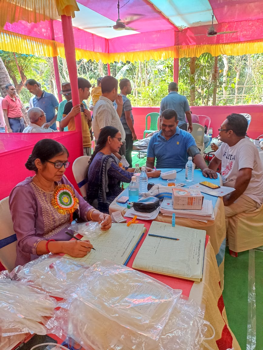 Quiet stretch of the camp — three beds in parallel, all running smoothly. — Guma blood donation camp