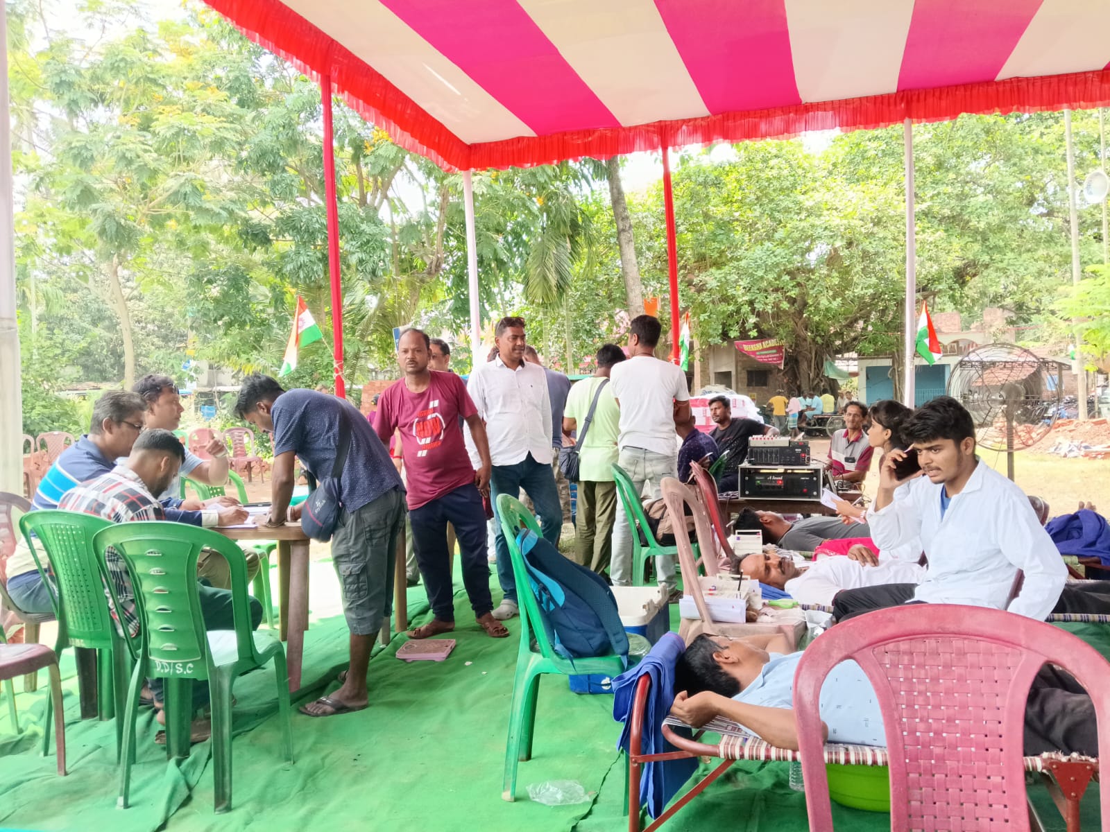 Donor giving a thumbs-up halfway through the pull. — Ghola blood donation camp