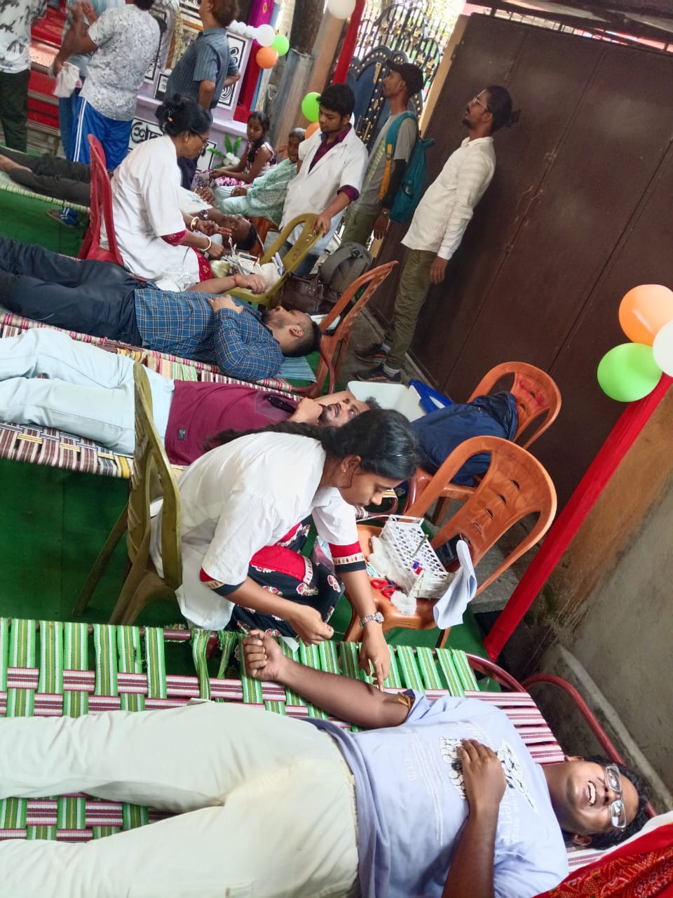 Quiet stretch of the camp — three beds in parallel, all running smoothly. — Barasat blood donation camp